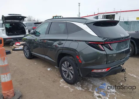 2022 Hyundai Tucson Hybrid Blue z USA, uszkodzony, nr VIN KM8JBCA10NU038377